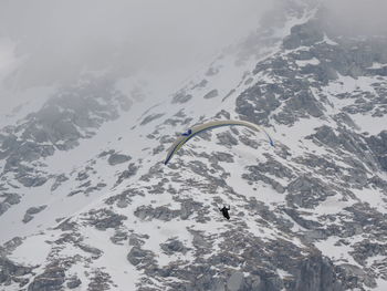 Scenic view of snow covered mountains