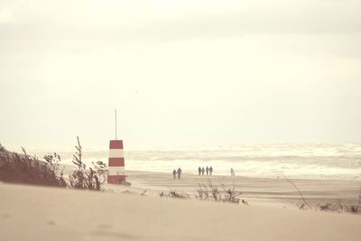 Scenic view of beach against clear sky