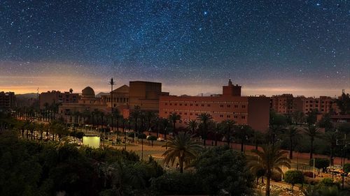 Buildings against sky in city at night