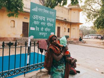 Man with umbrella in a building