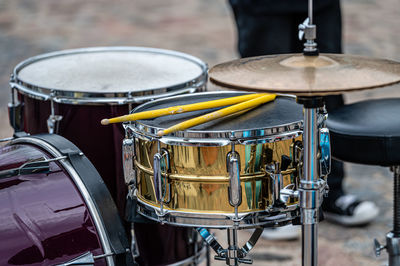 A set of plates in a drum set. at a concert of percussion music, selective focus, close-up