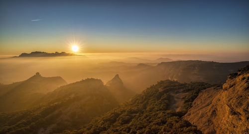 Scenic view of mountains during sunset