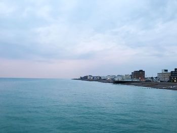 Scenic view of sea against cloudy sky