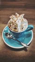 High angle view of dessert in cup on table