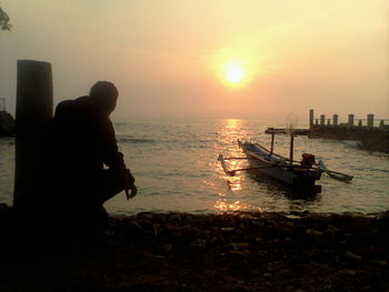 Scenic view of sea at sunset