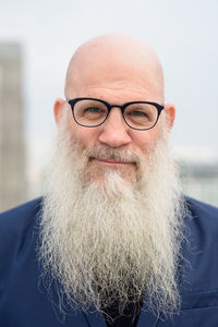 Portrait of man wearing eyeglasses