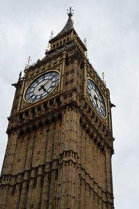 Low angle view of big ben against sky