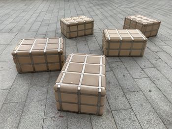 High angle view of stack arranged in box