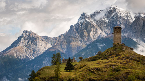 Scenic view of snowcapped mountains against sky