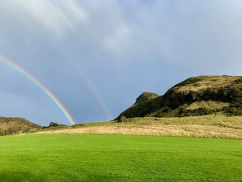 Scenic view of rainbow against sky