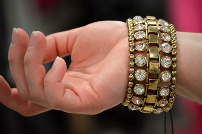 Cropped hand of woman wearing bangle