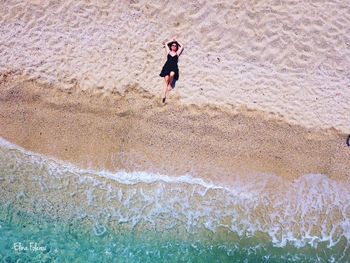 High angle view of woman on beach