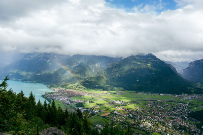 Mountains of interlaken switzerland and rainbow in view 