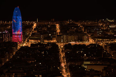 Aerial view of illuminated city at night