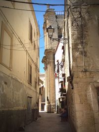 Narrow alley along buildings