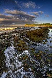 Scenic view of sea against sky during sunset