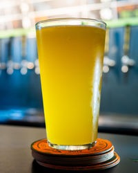 Close-up of beer in glass on table