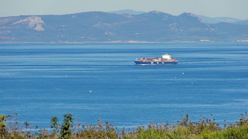 High angle view of ship sailing in sea against sky