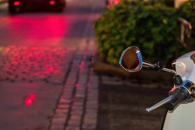 Close-up of bicycle on street