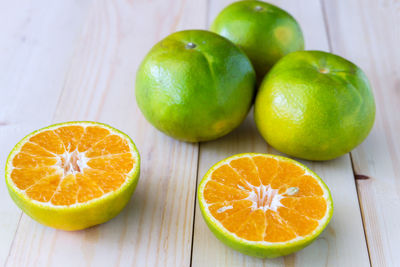 Close-up of oranges on table