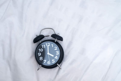 Close-up of clock on the wall