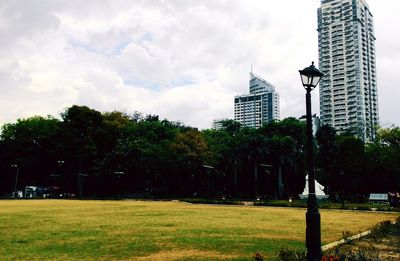 Buildings in city against sky