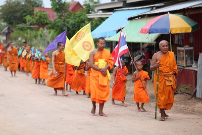 Group of people standing on street