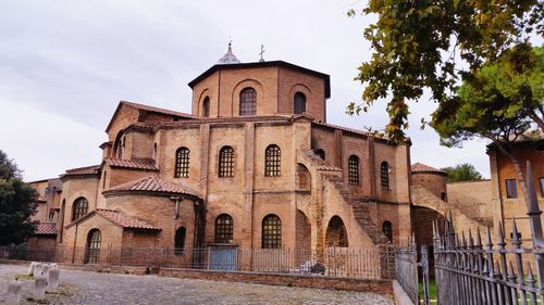 Low angle view of historic church against sky