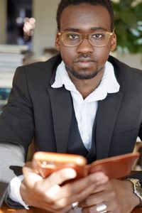 Portrait of man using laptop