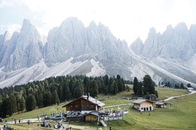 Panoramic shot of trees and houses against sky