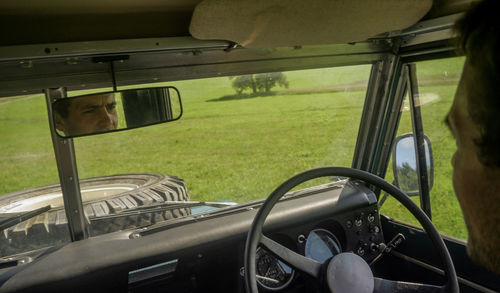 Close-up of man driving car