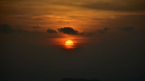 Scenic view of dramatic sky during sunset