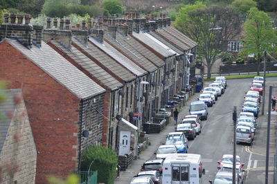 High angle view of cars on street in city