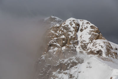 Scenic view of snowcapped mountain against sky. marmolada. dolomites. italy