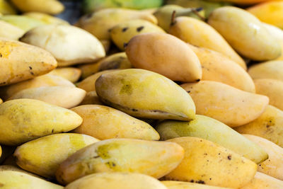 Full frame shot of mangoes at market stall