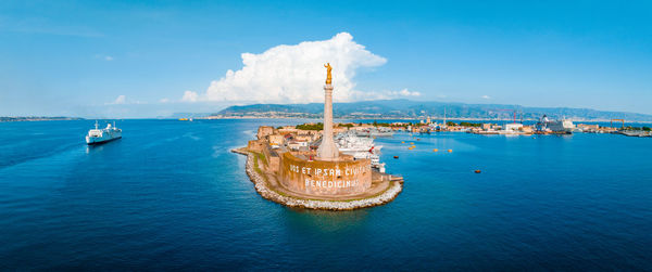 View of the messina's port with the gold madonna della lettera statue