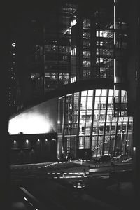 Modern office building in city at night