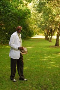 Full length of man standing on field