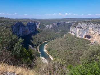 Aerial view of land against sky