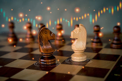 Close-up of chess pieces on table