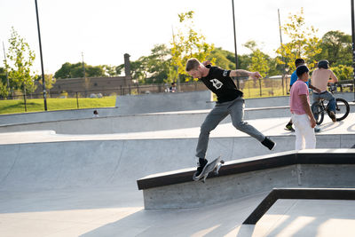 Full length of man skateboarding on skateboard