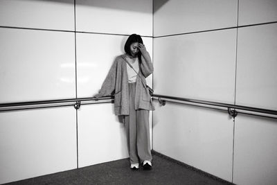 Low angle view of woman standing on floor