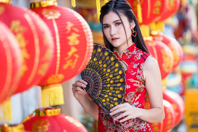 Portrait of smiling woman at temple