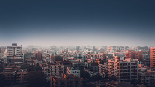 Cityscape against clear sky