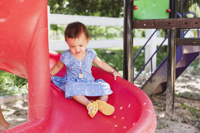 Cute boy playing in playground