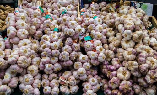 Close-up of garlics for sale in market