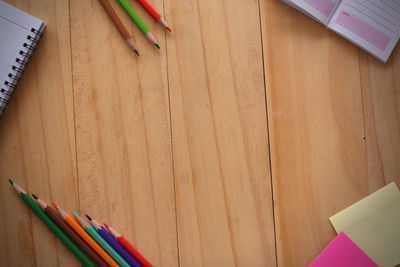 High angle view of multi colored pencils on table