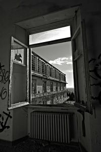 Abandoned building against sky