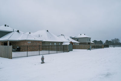 Built structure on snow covered landscape