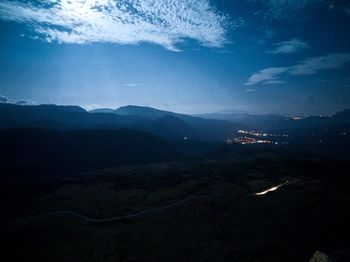 Scenic view of silhouette mountains against sky